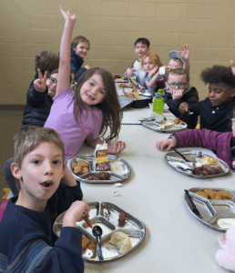 Students excited to use reusable stainless-steel trays and sporks